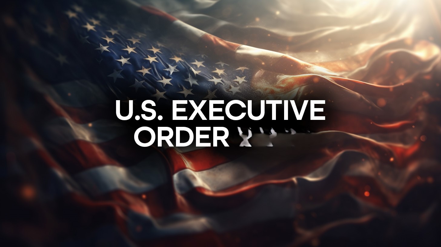 A dramatic, partially illuminated U.S. flag waves in the background with bold white text over it reading “U.S. Executive Order” and a row of small black chess pieces below the words.