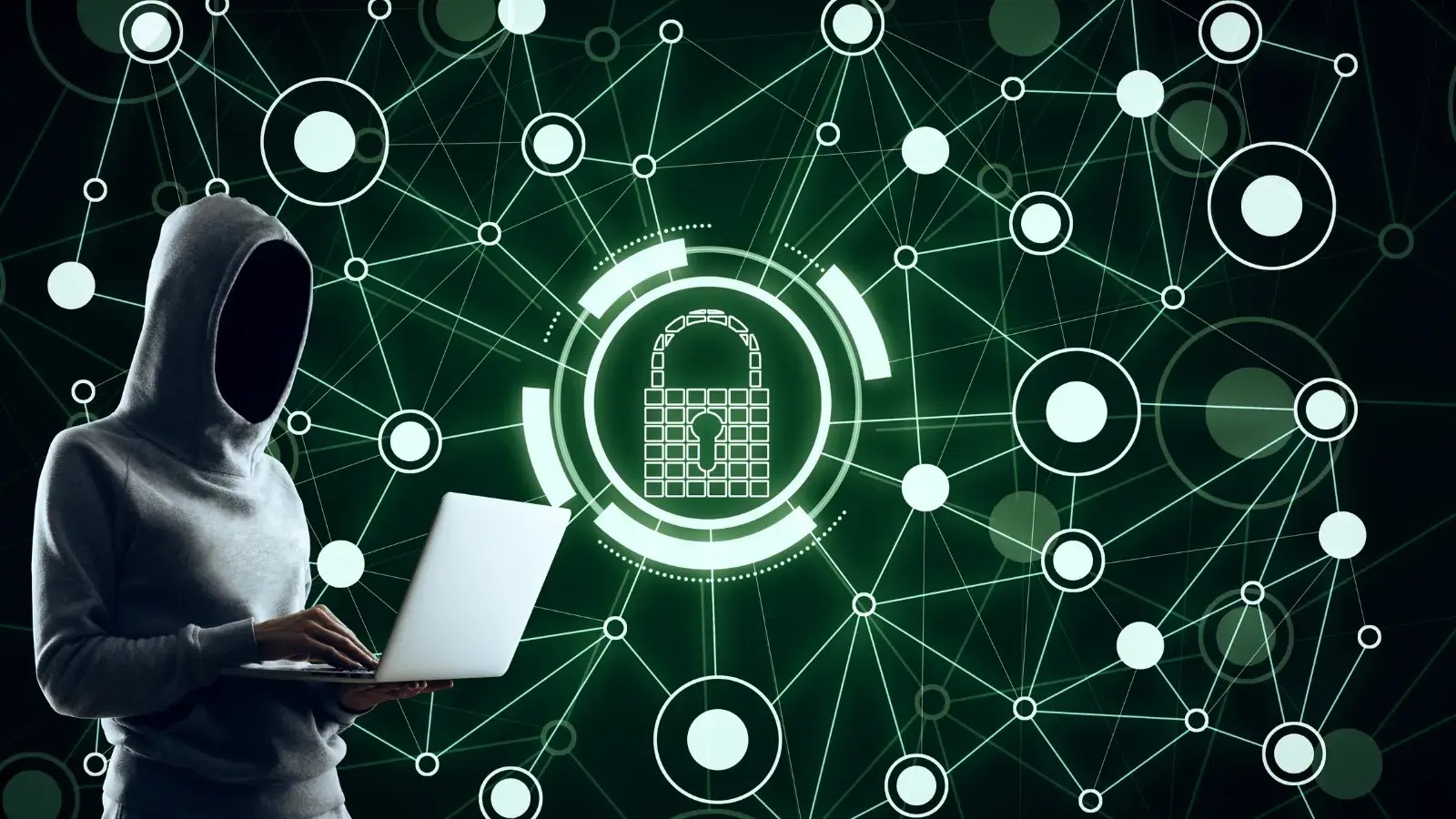 Hackers Can Exploit default ServiceNow AI Assistants configurations to Launch prompt injection attacks (1) A faceless person in a hoodie uses a laptop, standing in front of a digital background with a glowing lock symbol and interconnected nodes, representing cybersecurity and data protection.