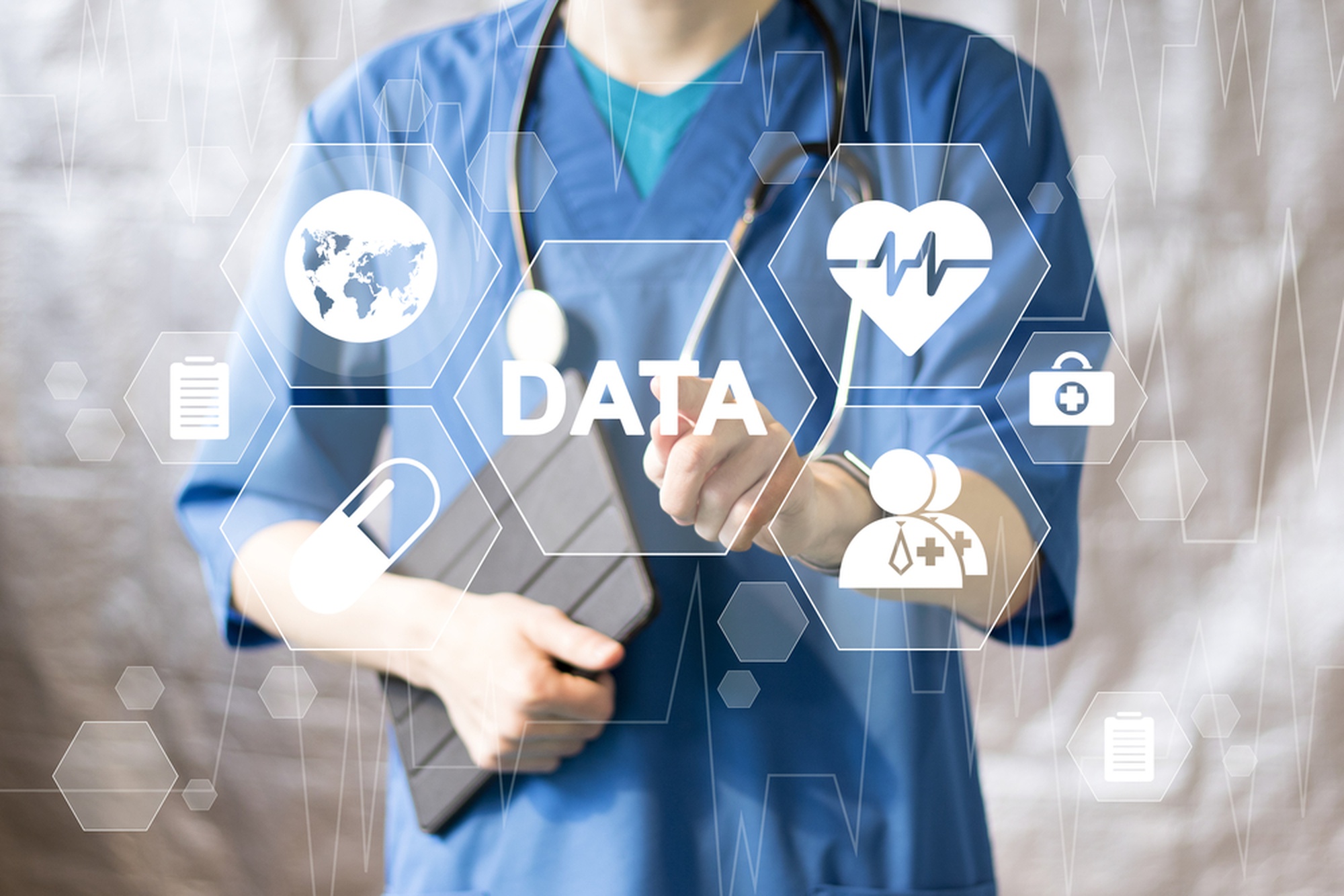 A healthcare professional in blue scrubs holds a tablet. Transparent icons related to medicine and data, such as a heart, stethoscope, and globe, are overlaid with the word DATA in the center.