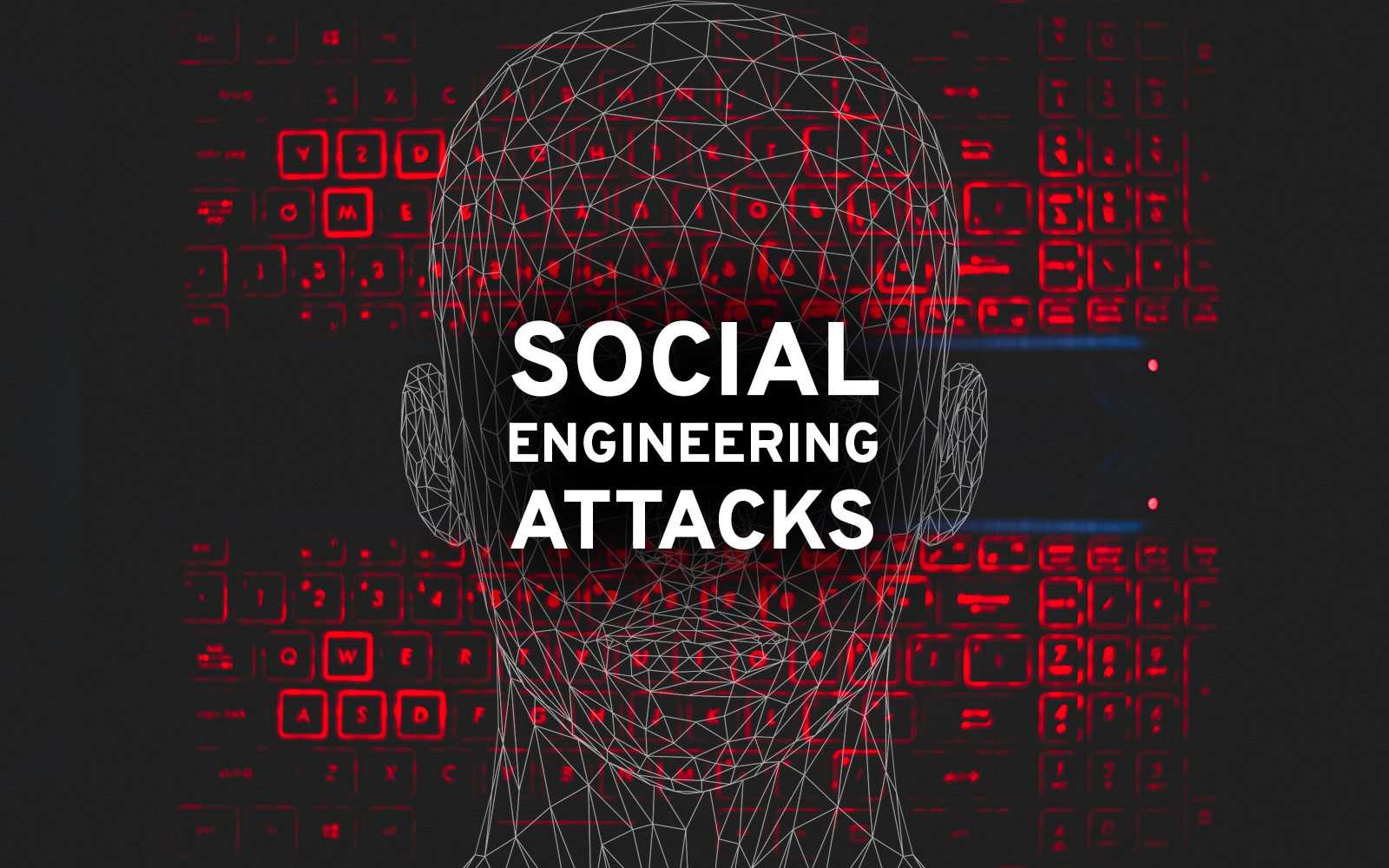 A wireframe human head is overlaid on a red-lit keyboard with the words SOCIAL ENGINEERING ATTACKS in bold white text across the center.