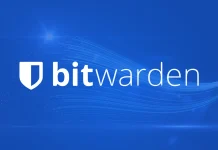 Bitwarden logo on a blue background, featuring a white shield icon to the left of the word bitwarden in white text, with subtle light streaks in the background.