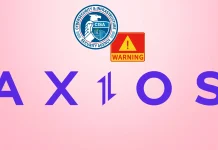 A pink background with the partial word AXIOS in purple, a blue and white government-style seal, and a red and yellow warning sign above the letters.
