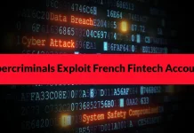 A digital screen with code and cybersecurity-related words like Data Breach, Cyber Attack, and System Safety Compromised. A red banner reads: Cybercriminals Exploit French Fintech Accounts.