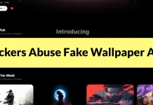 A website with dark-themed graphics displays a prominent yellow banner reading Hackers Abuse Fake Wallpaper Apps in bold black text. Various digital artwork thumbnails are visible in the background.