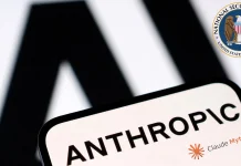 A smartphone displays the Anthropic logo in front of a blurred AI sign, with part of the U.S. National Security Agency (NSA) seal visible in the upper right corner.