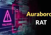 A digital screen displays a warning sign with an exclamation mark and the word MALWARE. The text Aurabord RAT is prominently shown on the right side against a dark background.