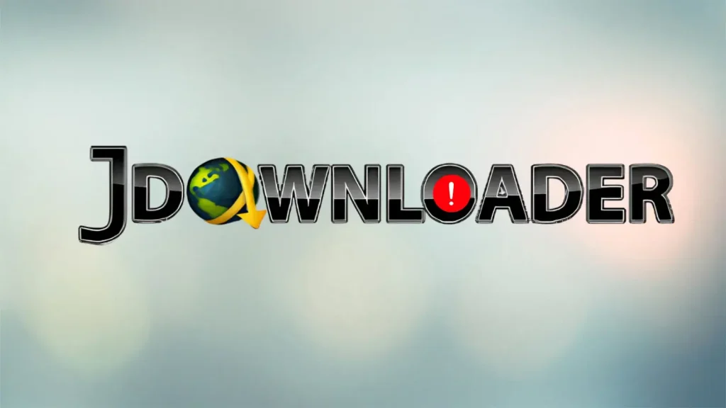 The word JDownloader with the letter O replaced by a globe wrapped in a yellow arrow and the letter A replaced by a red warning icon, on a blurred light background.