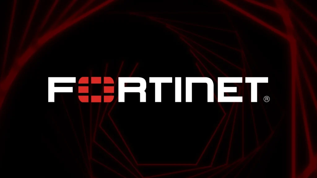 FortiBleed-Credential-Harvesting-Attack-1024×576 The image shows the word FORTINET in bold white letters, with a stylized red shield design replacing the O. The background features dark geometric shapes and red lines forming a tunnel-like effect.