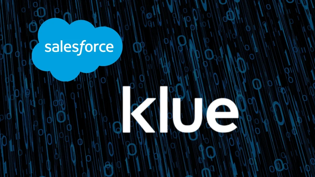Klue-Integration-Breached-Salesforce-1024×576 The Salesforce logo and the word klue are displayed over a digital background with blue binary code (0s and 1s) on a black backdrop.